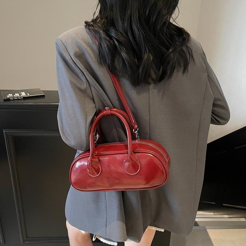 New niche high-end sense simple solid color personality versatile fashion portable messenger women's bag