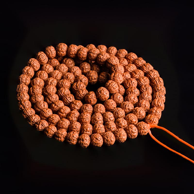 Handcrafted Dragon Scale Bodhi Seed Bracelet with Red Burst Finish