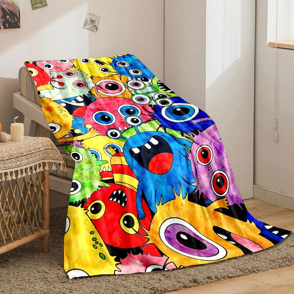 Brightly colored cartoon monsters with big round eyes and playful expressions. for all seasons blanket lunch break throw gift