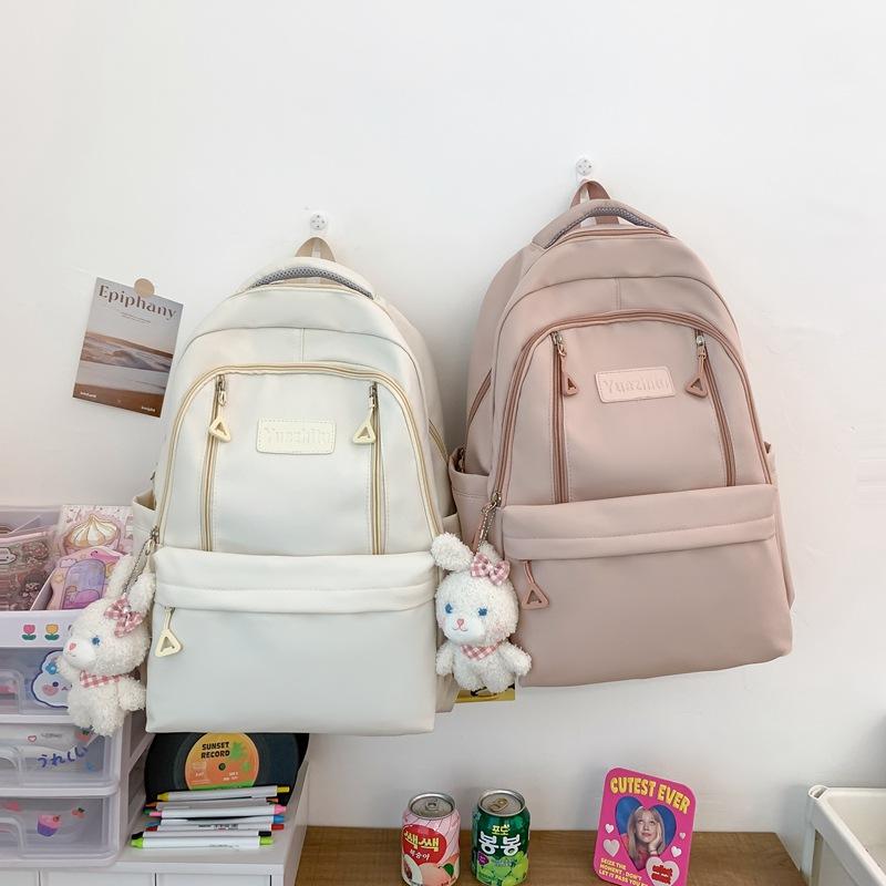 Small Fresh College Style Ins Vertical Zipper Model Labeled Student Schoolbag 2023 Large Capacity Junior High School Student Backpack