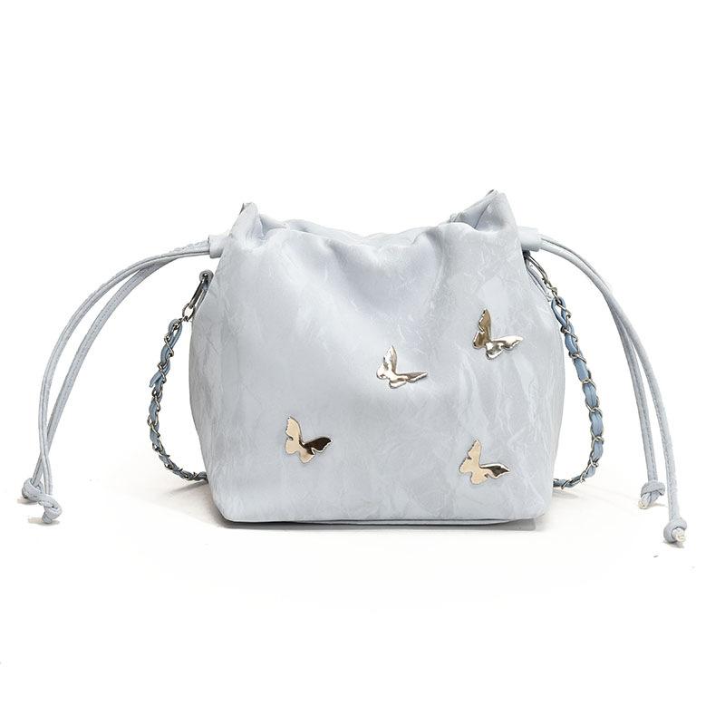 Fashion casual chain messenger bag summer simple pumping strap personalized butterfly shoulder bag new bucket women's bag