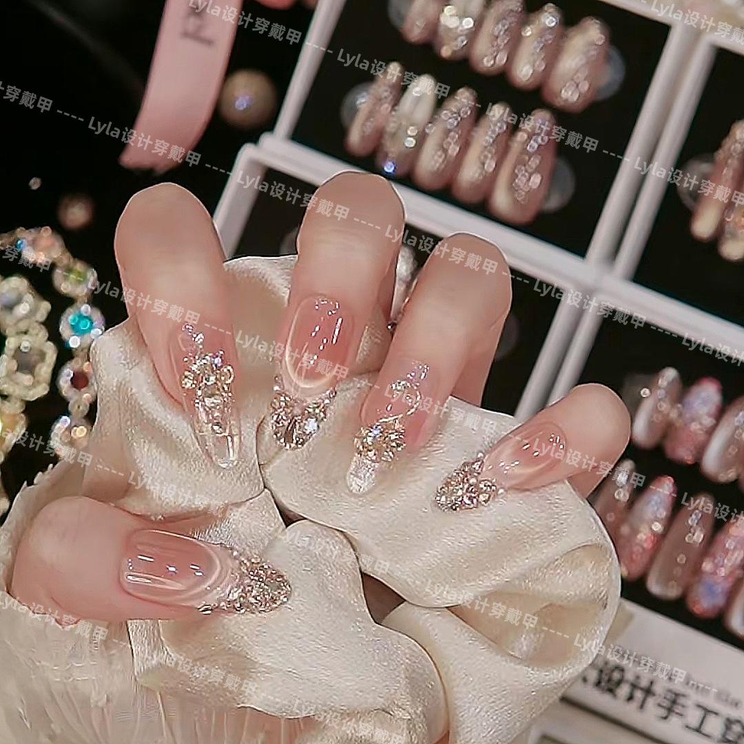 Nude Pink Gradient Cat Eye Nails with Fine Glitter & Large Diamond Embellishments