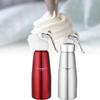 Bottiglia sifone per panna montata in acciaio inox di alta qualità, ideale per decorare e guarnire il caffè, disponibile nei formati da 500 ml e 1000 ml.