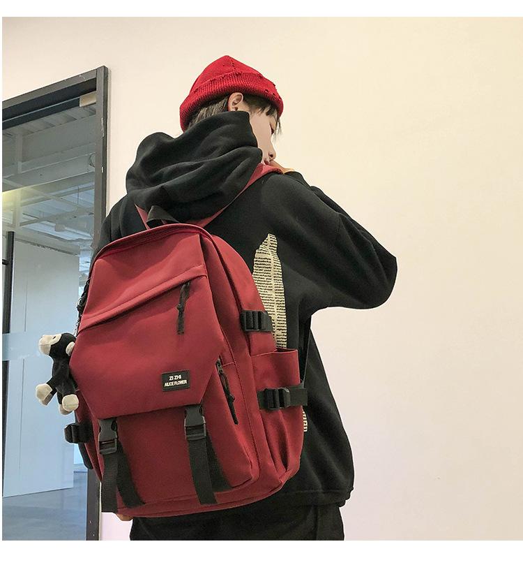 

School bag female high school large capacity trend backpack male college student fashion trend couple backpack бордовий