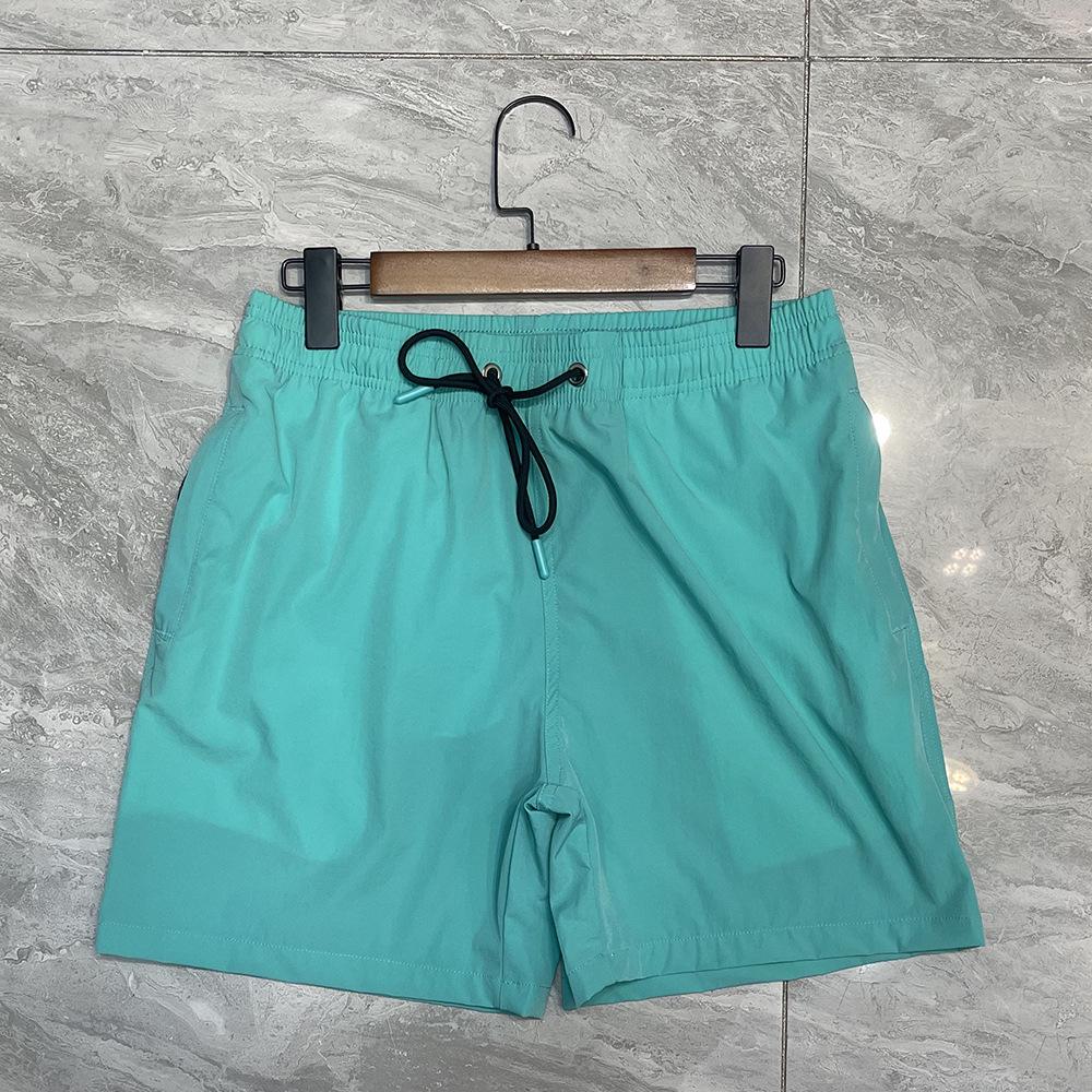 

Мужские быстросохнущие нейлоновые эластичные плавки: Свободные пляжные шорты больших размеров для отпуска или горячих источников. Double Extra Large изумрудный