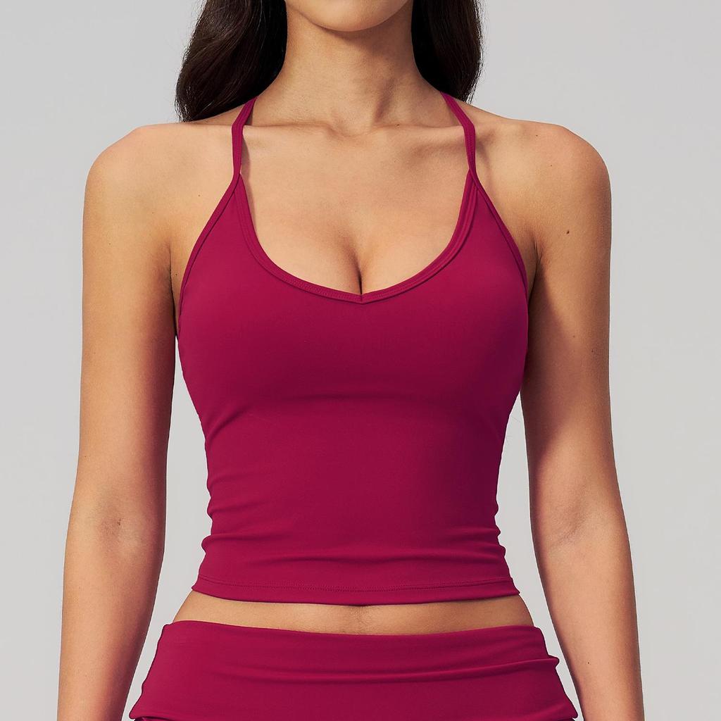 Introducing the Stylish Women's Quick-Dry Yoga Tank Top: Beautiful Design, Perfect for Fitness & Sports.