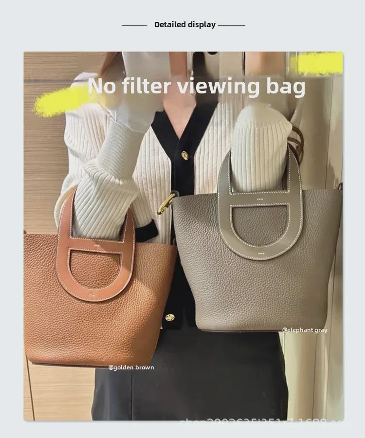 Handväska i äkta koskinn för kvinnor - Vår 2023 Hinkväska med Grisnäsa-design och Enkel Axelrem