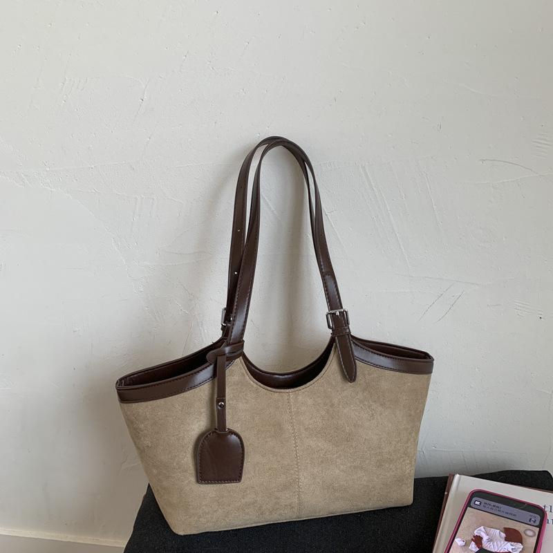 Simple casual tote bag women's 2025 autumn new high-value foreign style one-shoulder armpit light luxury handbag