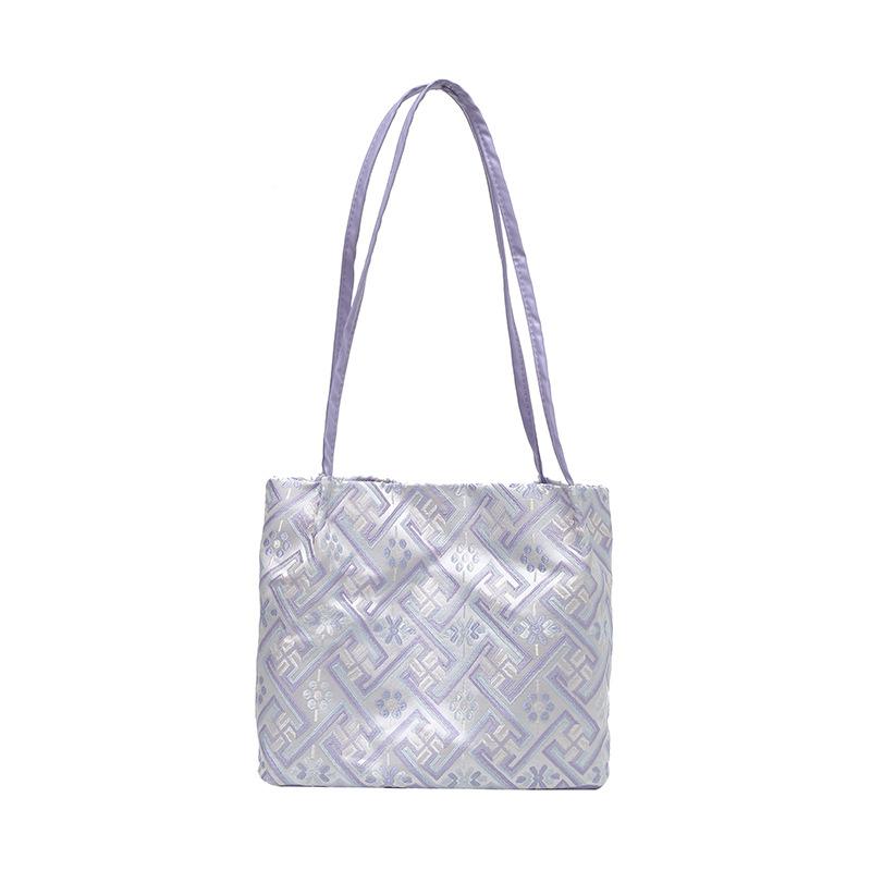 

Tote bag women s new fashionable versatile portable shoulder bag niche large-capacity armpit bag фиолетовый