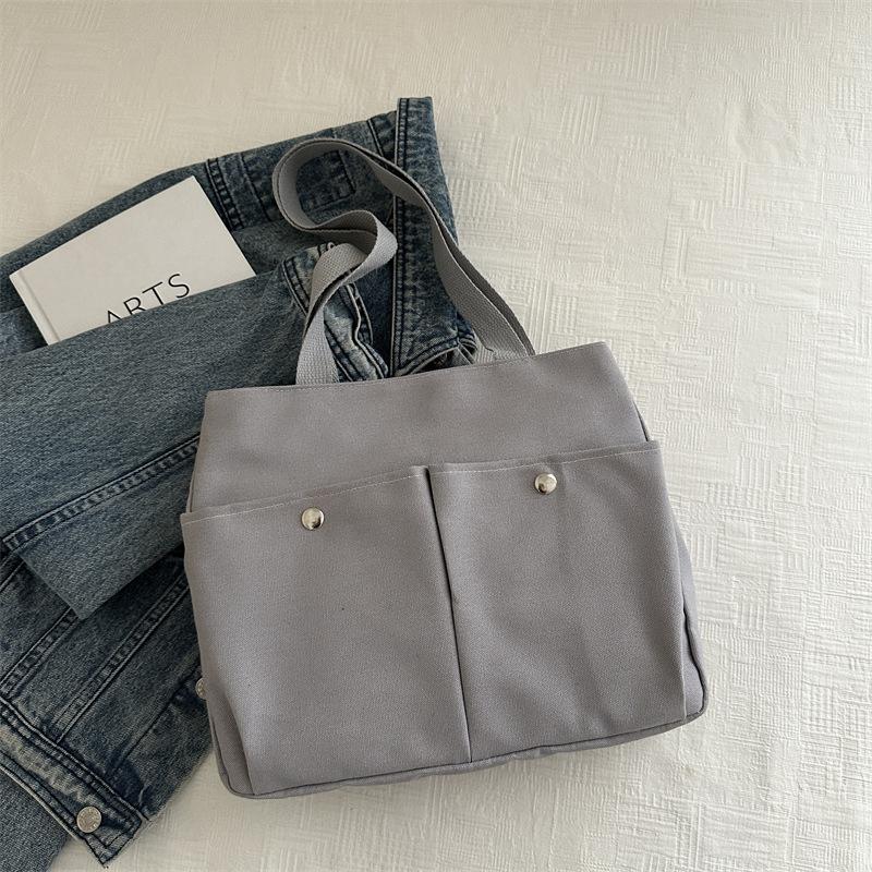 

2024 new summer fashion simple handbag women s bag commuter shoulder bag simple fashion large capacity fashion women s bag сірий колір