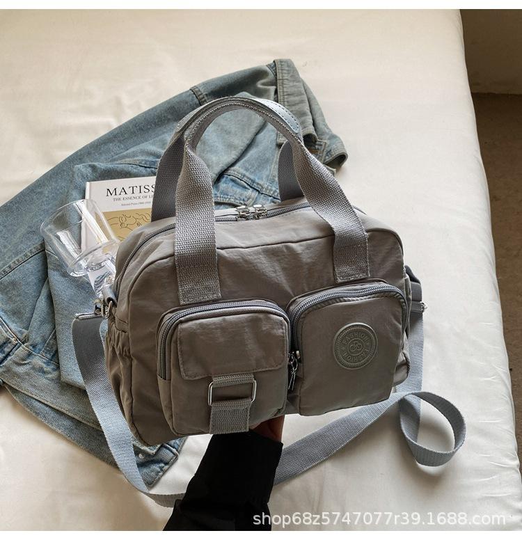 Korean Version of Casual Portable Small Square Bag Women's New Versatile Fashion Shoulder Messenger Bag Nylon Cloth Multi-pocket Pillow Bag
