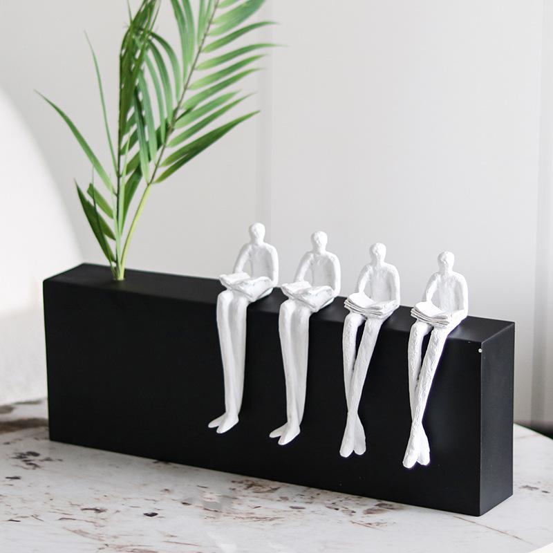 Simple Modern Side By Side Sitting and Reading Character Combination Decoration Sample Room Living Room TV Cabinet Creative Decoration