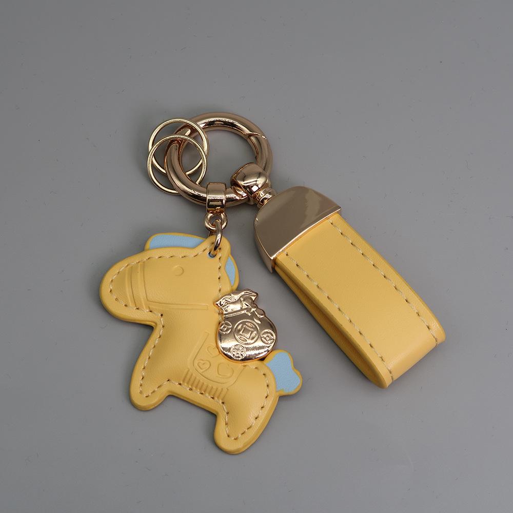 Instant Wealth Leather Keychain with Cartoon Pony Pendant for Couples – Trendy Bag and Car Accessory