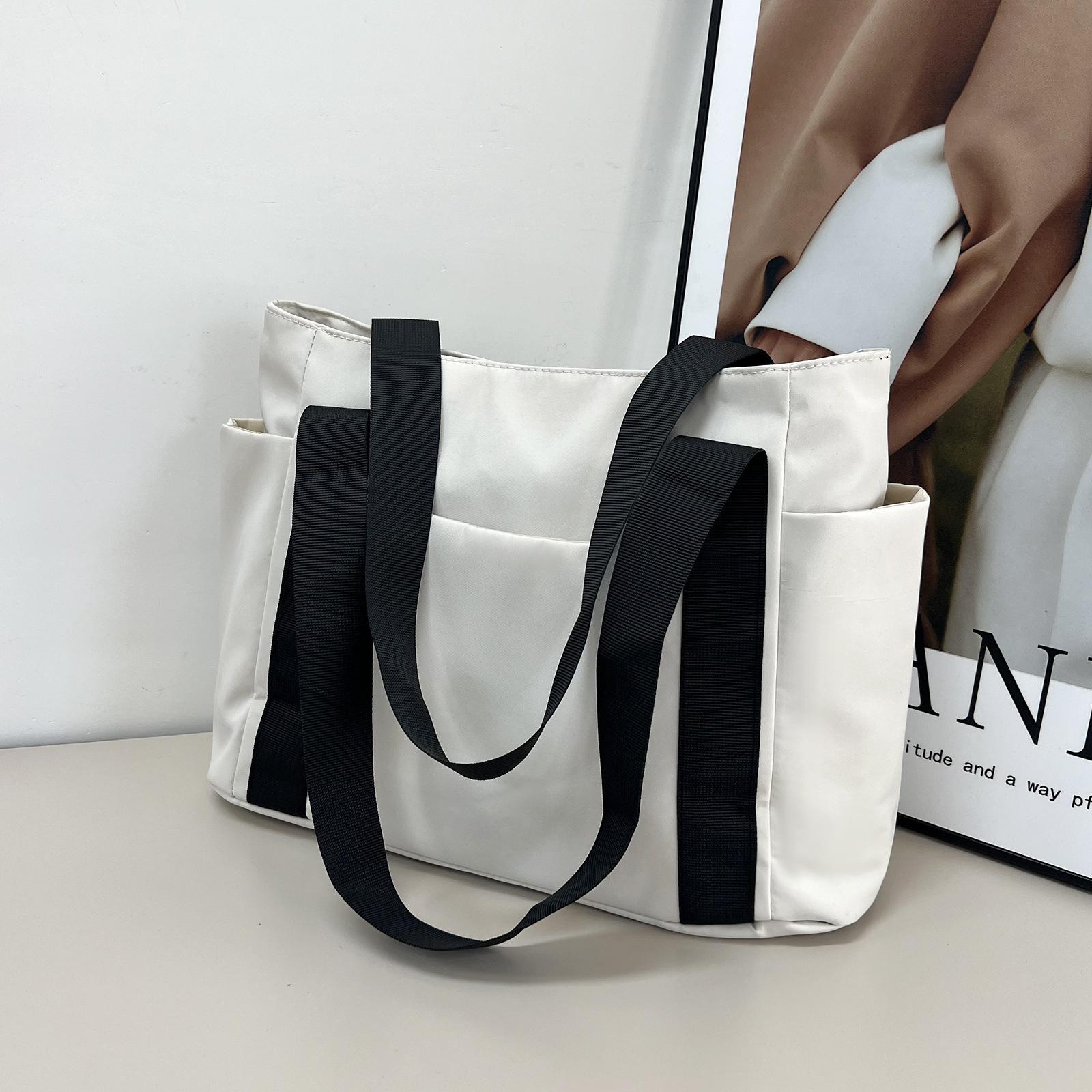 Neue Damenhandtasche Japanische einfarbige Tragetasche Schultertasche Lässig Einfach Mama Ausgehtasche Canvas Handtasche 29x43x13cm