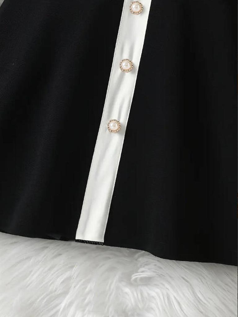 Girls' Black and White Long-Sleeve Knit Dress with Peter Pan Collar and Faux Pockets