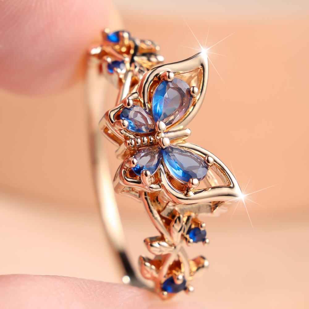 Elegant Gold Color Blue Zircon Flower Side Butterfly Ring for Women Daily Wear