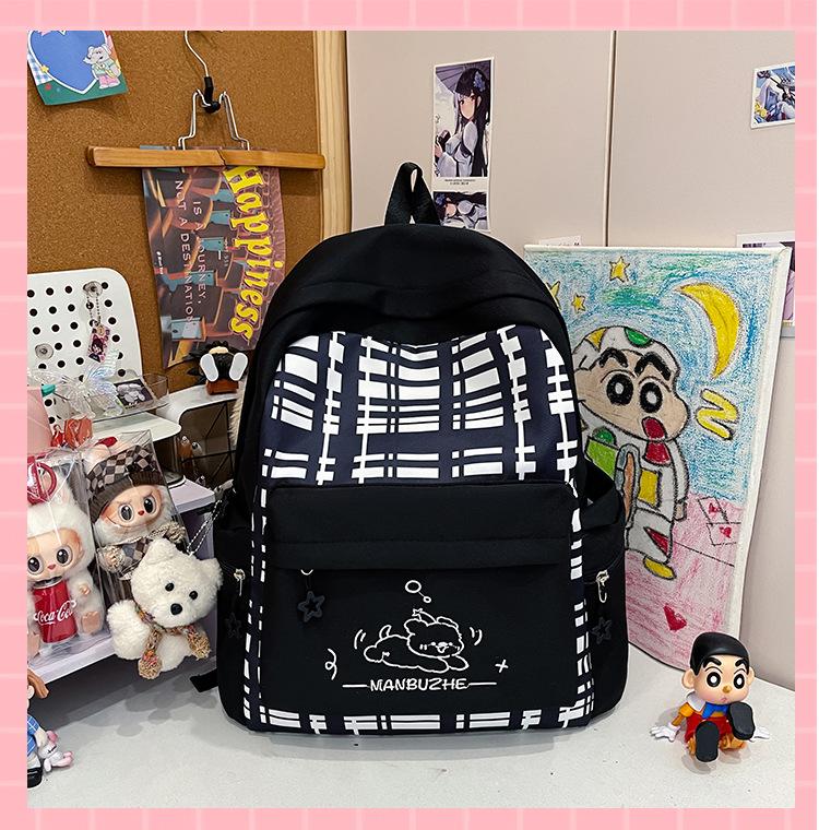 Schoolbag New Japanese plaid schoolbag for women, junior high school students Large capacity, light and wear-resistant cute cartoon backpack