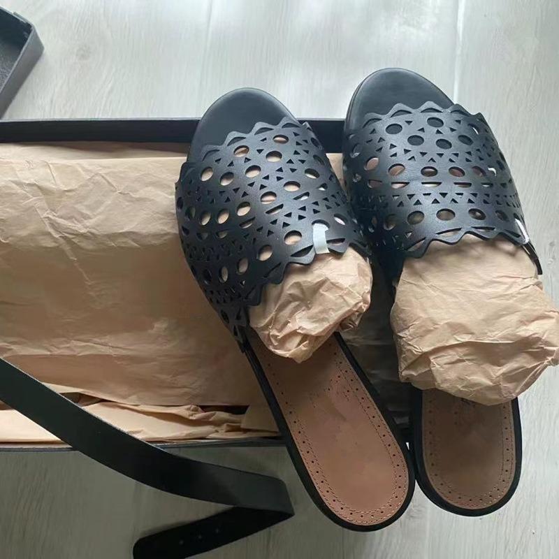 Leather Hollowed-out Laser Engraved Leather One-word Flat-bottomed Cool Slippers Women's Fashion 2025 New Summer Sandals