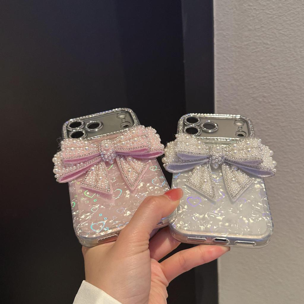 Porous Love Shell Pattern Phone Case for Apple 17PROMAX/15, Material 11/14, with Bow Accessory.
