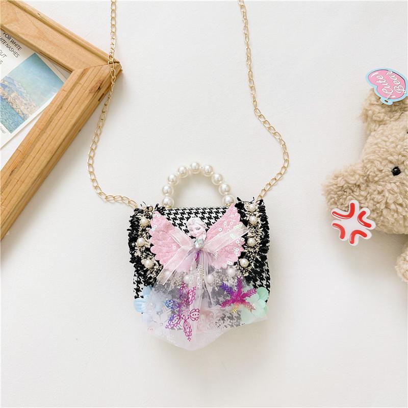 Stilvoller Prinzessinnen-Rucksack für Mädchen, verziert mit Perlen und Cartoon-Mustern in lebendigen Farben