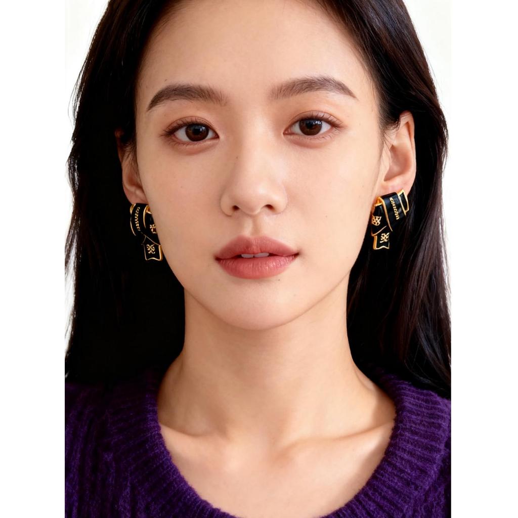Black & Gold Enamel Twist Earrings: Versatile Luxury Studs for Autumn/Winter 2025