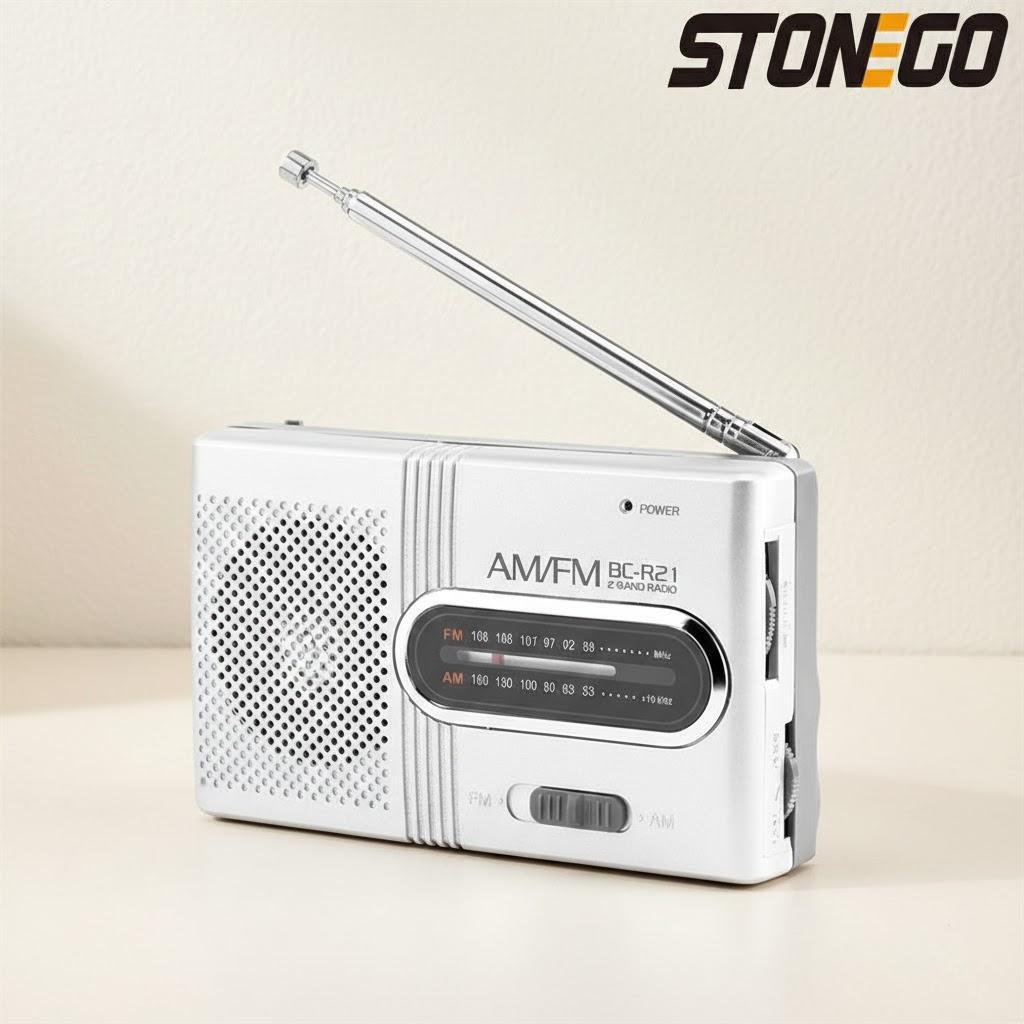 

Portable AM FM Mini Radio Speaker Universal Music Player with Stereo Sound Battery Not Included срібний