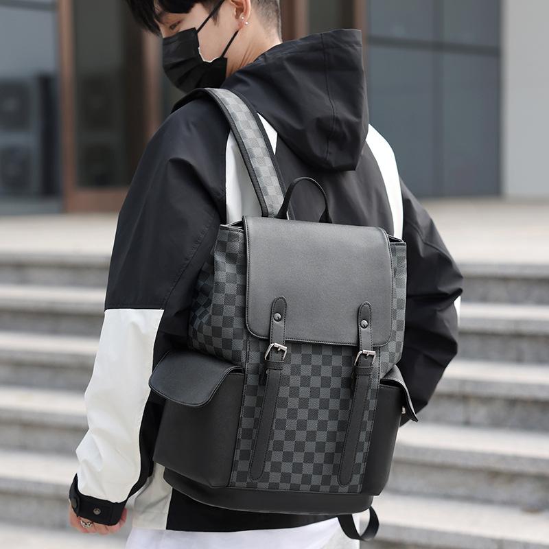 Neue koreanische Version Business-Rucksack Leder Große Kapazität Herren und Damen Trend karierter Rucksack Reisetasche Studenten-Computertasche