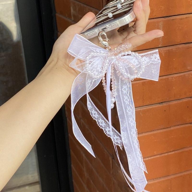 Eleganter Schlüsselanhänger mit Perlen, Handyanhänger, einzigartiger Schlüsselanhänger, Schleife, Taschenanhänger, Accessoire für Geldbörse und Rucksack