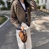 Autumn and winter new striped smiley face knitted cardigan sweater women's jacket fashionable versatile lazy V-neck long-sleeved top
