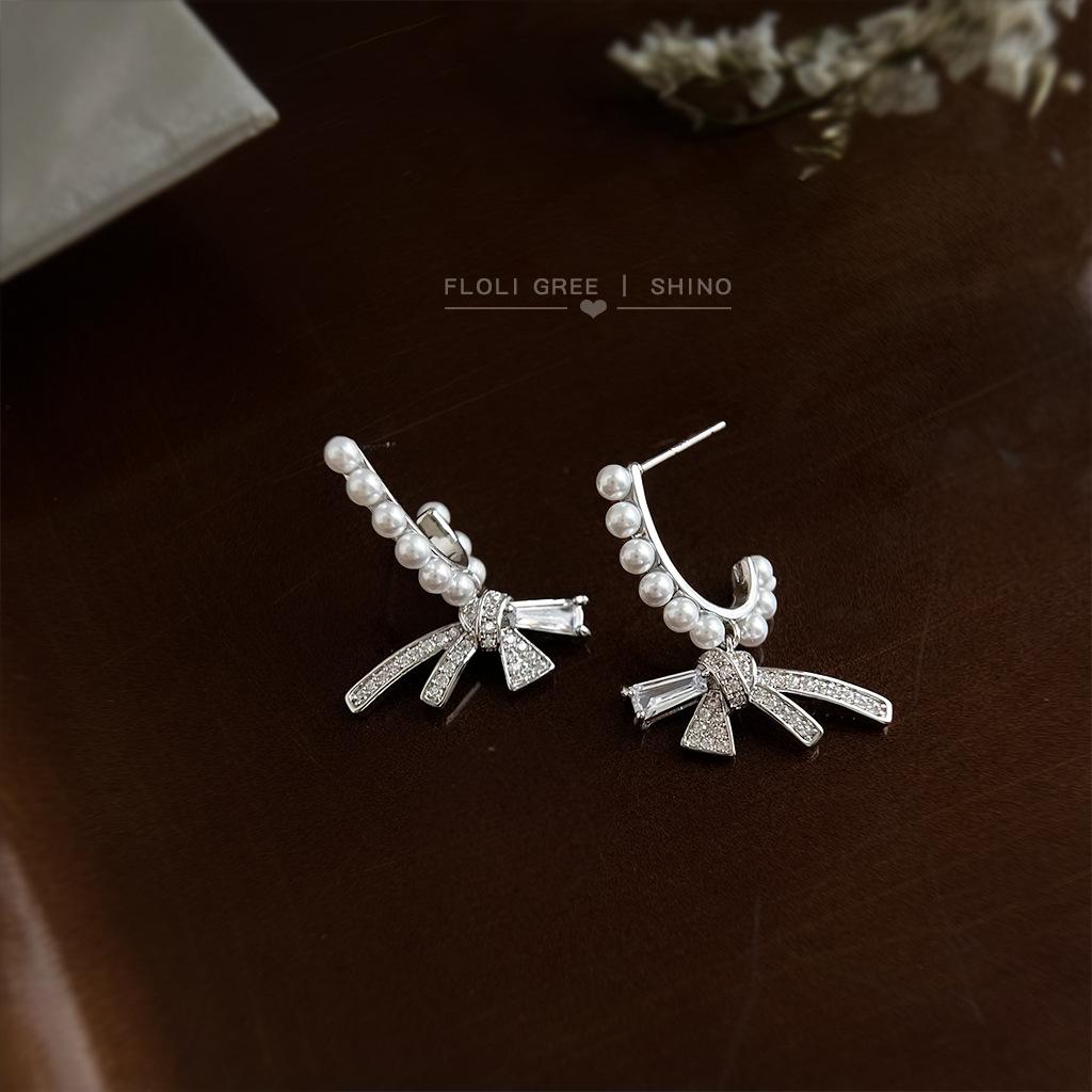 Original design micro-inlaid zircon bow wind 925 silver needle new earrings, earrings