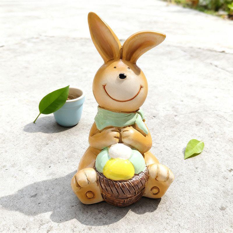 The retro brown rabbit statue decoration ornament with eggs is suitable for Easter home garden desktop decoration.