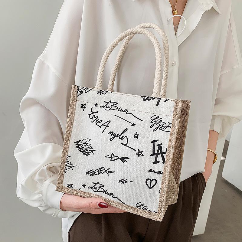 Korean Ins Cute Handbag Women's Summer New Style Student Hand Lunch Box Lunch Box Lunch Bag Outdoor Snack Bag Trendy