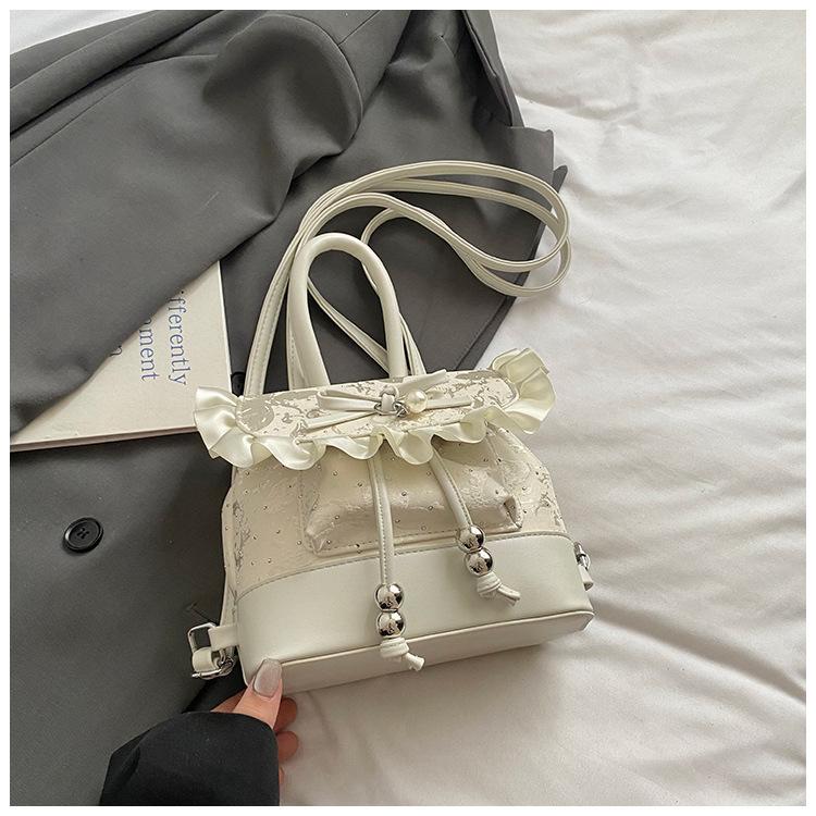 

Korean version of fashionable girl style portable small bag 2025 new lace lace high value casual backpack белый
