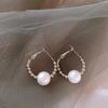 Simple and cold style temperament personality small pearl earrings women's geometric circle pearl versatile stud earrings
