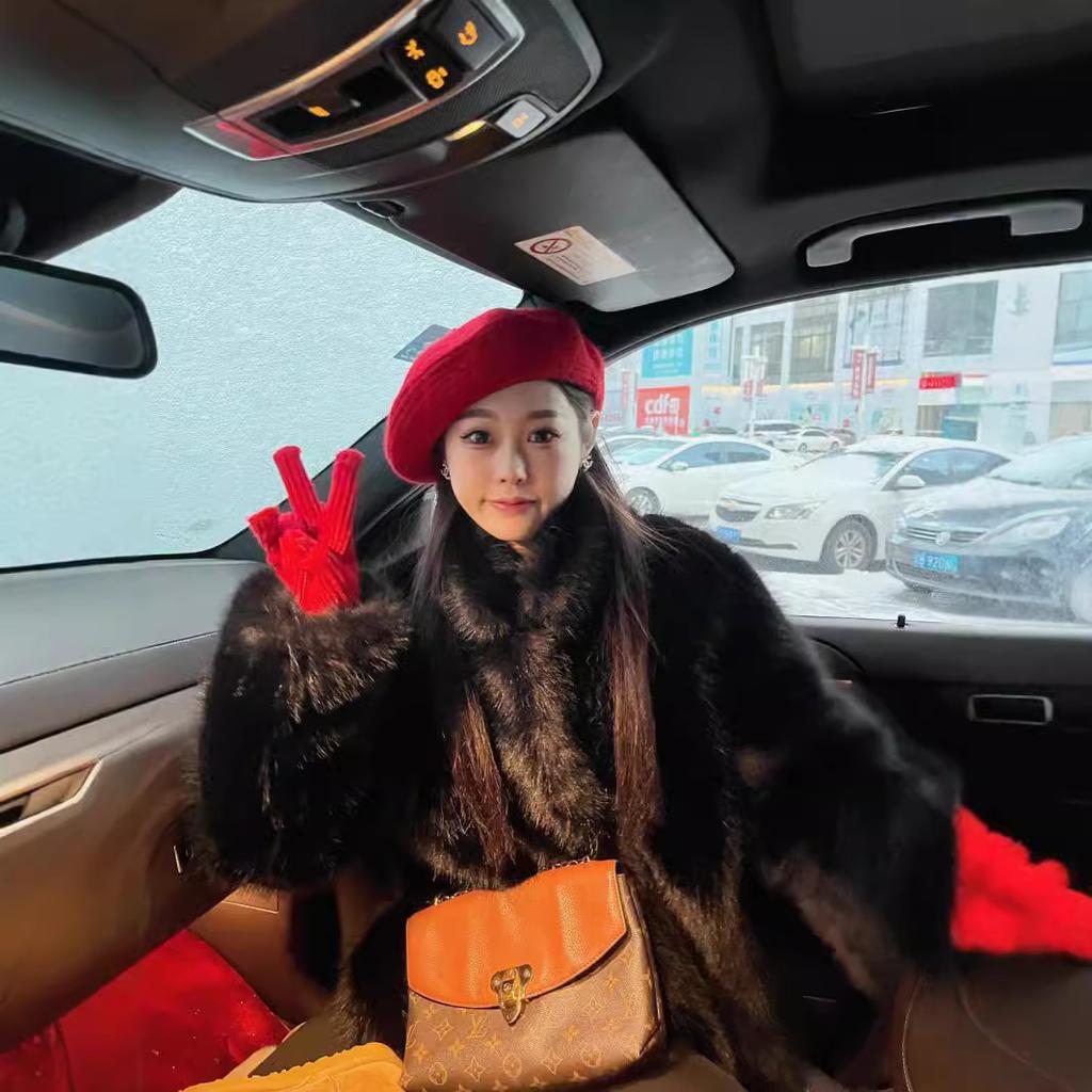 Imitation fox fur black fur coat women's winter new stand-up collar environmentally friendly fur fur high-end coat medium and long