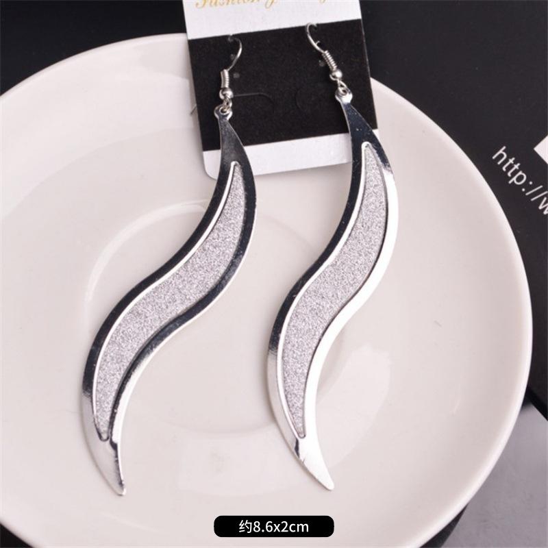 Fashion exaggerated niche temperament fringed earrings retro personality versatile sequined earrings women's long ear jewelry