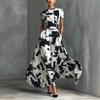 Europese en Amerikaanse moderne kunststijl zwart-wit abstracte print korte mouwen lange jurk hoge taille temperament kleding damesjurk