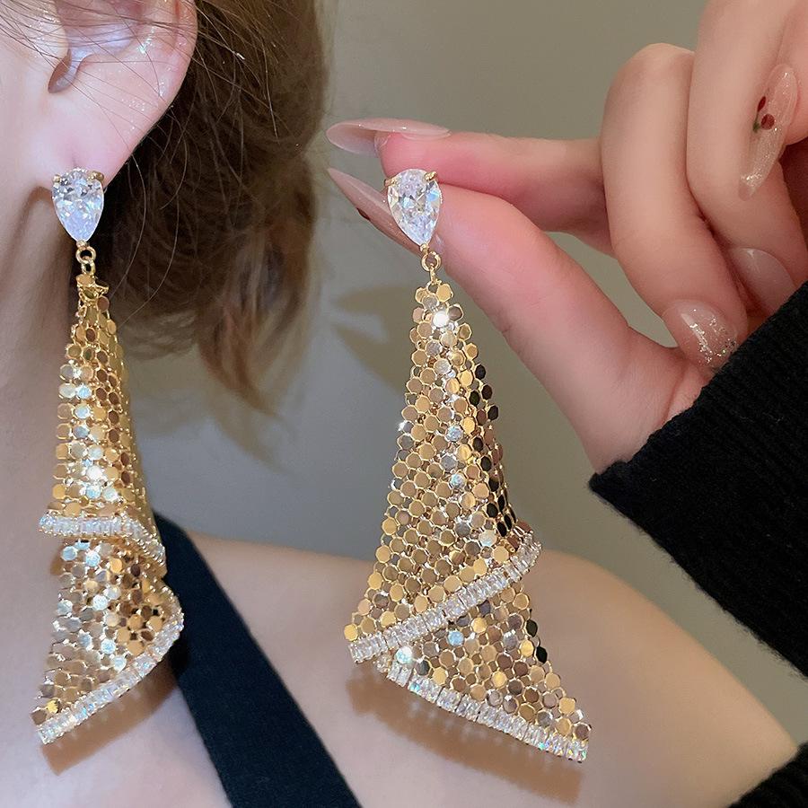 Silver Needle Geometric Openwork Round Pendant Earrings with European and American Exaggerated Style for Women.