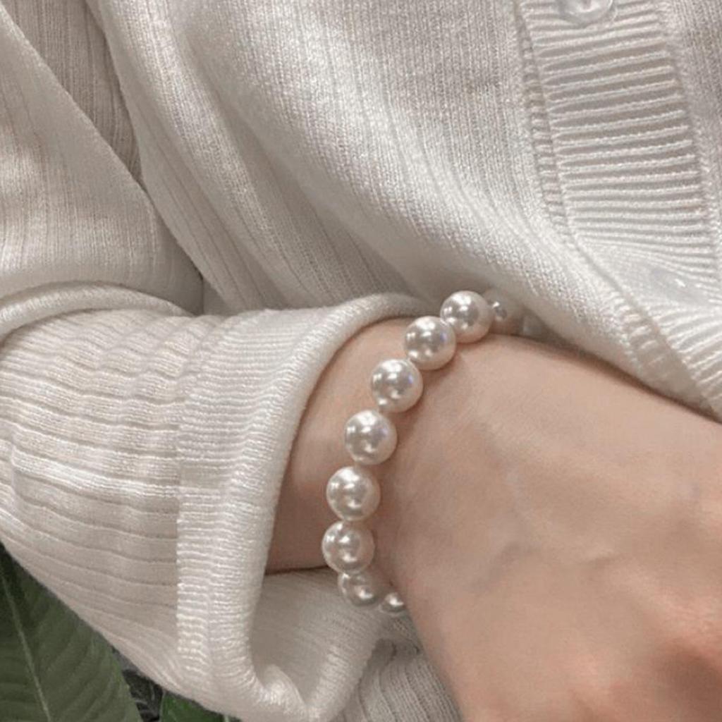 Elegant Multi-Piece Faux Pearl Bracelet for Women - Versatile, Elastic, and Stackable.