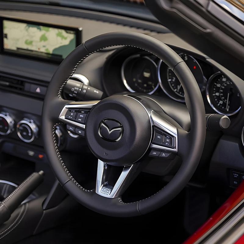 AAGI1 Car Steering Wheel Emblem Sticker Decoration Accessories For Mazda 2 3 6 5 Atenza CX3 CX5 MX5 CX7 Axela CX30 CX90 CX60 CX50 MX30