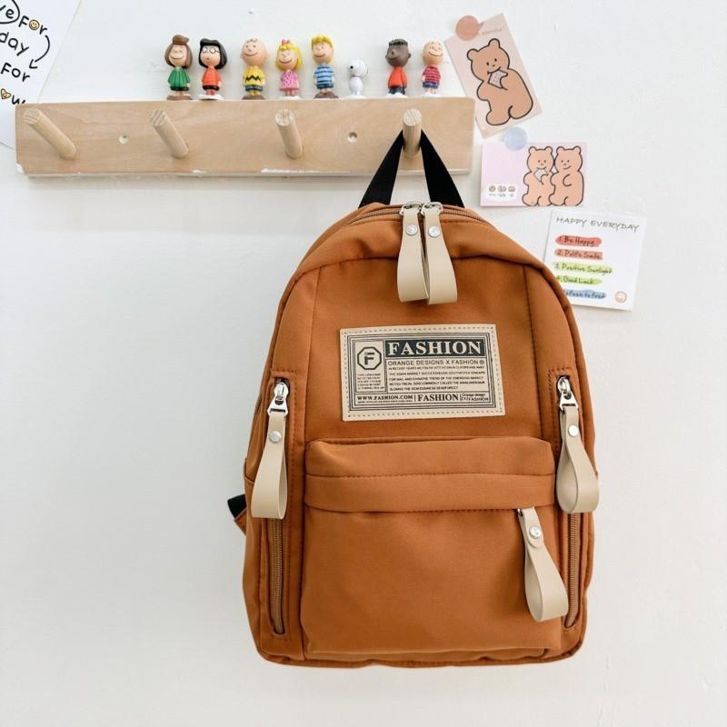 Moderní lehký plátěný batoh v korejském stylu pro děti s pohodlnými ramenními popruhy se vzduchovým polstrováním
