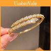 Braccialetto alla moda con design a serpente in rame placcato oro con pietre di zircone per l'uso quotidiano