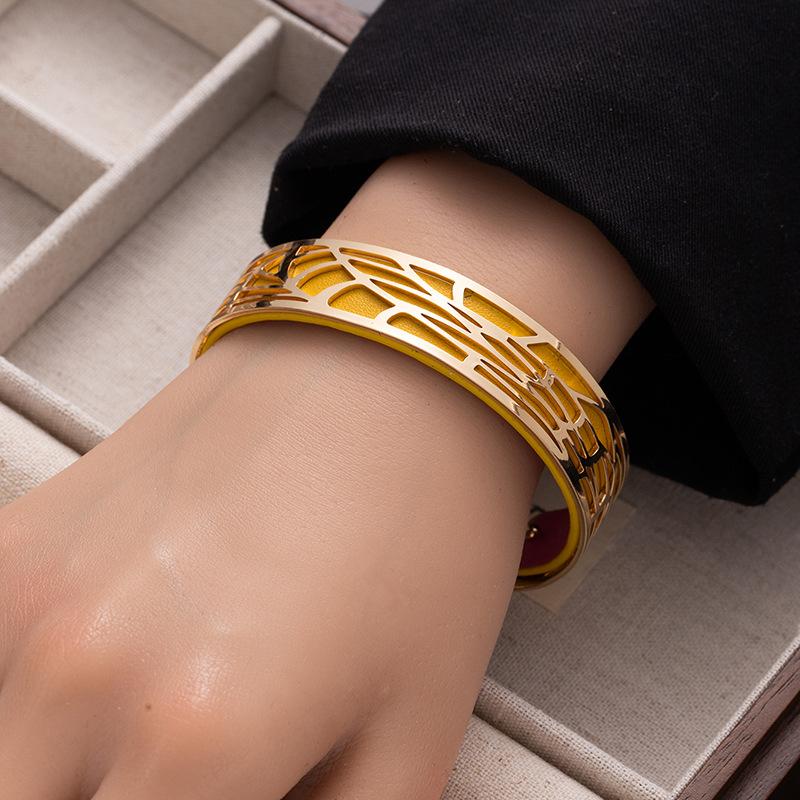 Fashion double-sided color pu leather wide bracelet women's hollow pattern titanium steel open bracelet