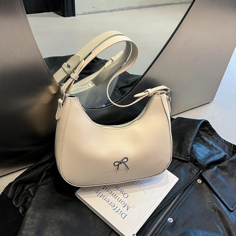 Neue modische einfarbige Tasche Textur lässige Schleife Knödeltasche Einzelne Schulter Achseltasche Mondzahn-Tasche schwarz