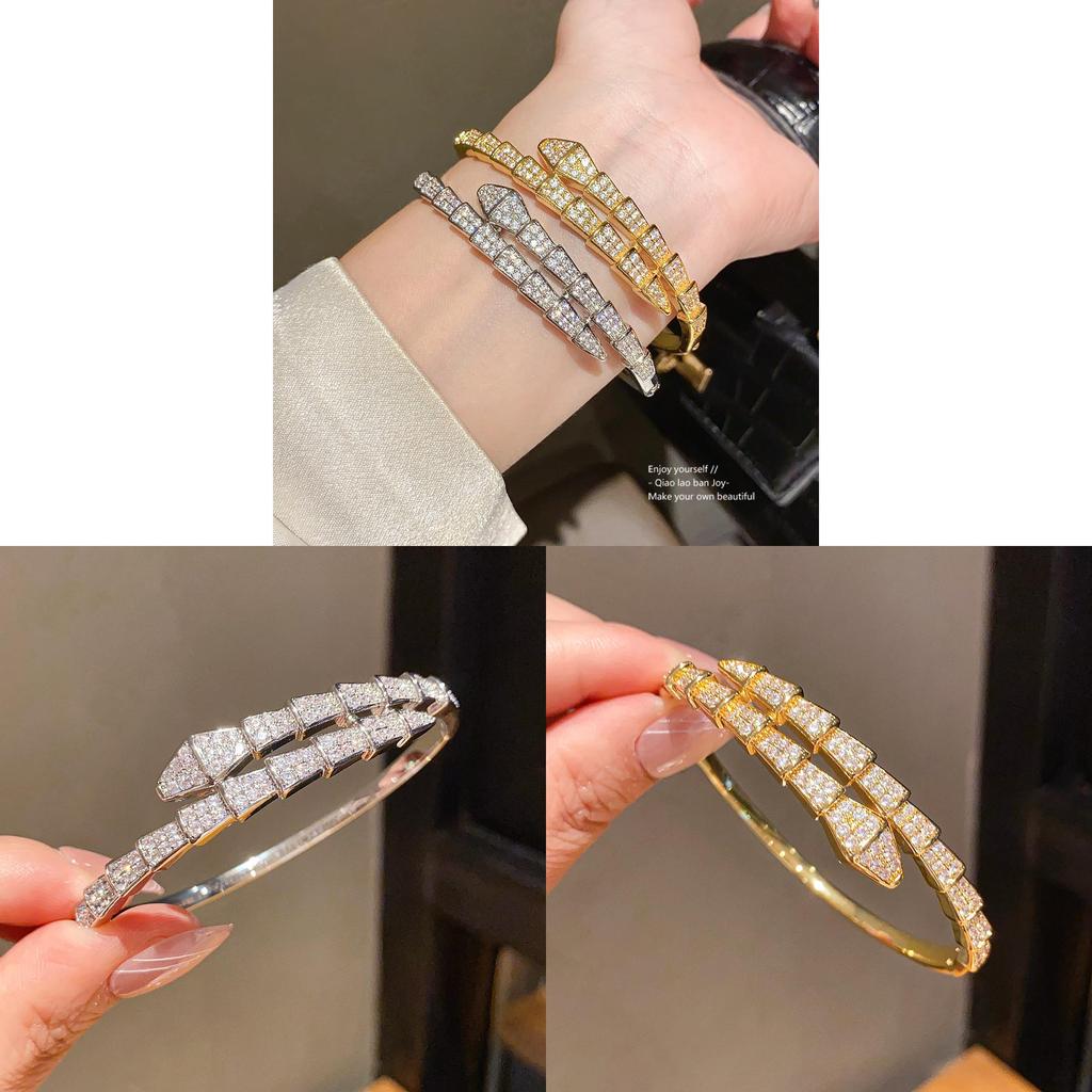 Bracciale di lusso a forma di serpente in rame placcato oro con accenti di zirconi per fashioniste