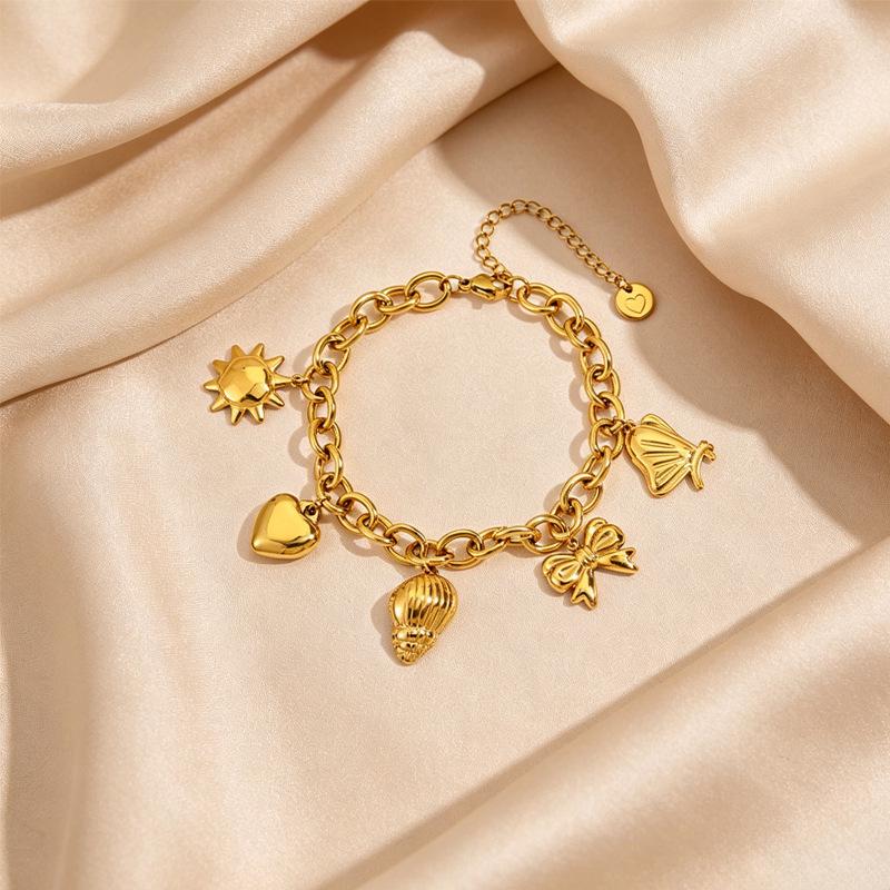 Women's European Retro Multi-Element Titanium Steel Bracelet with 18K Gold Plating and Pearl Accents