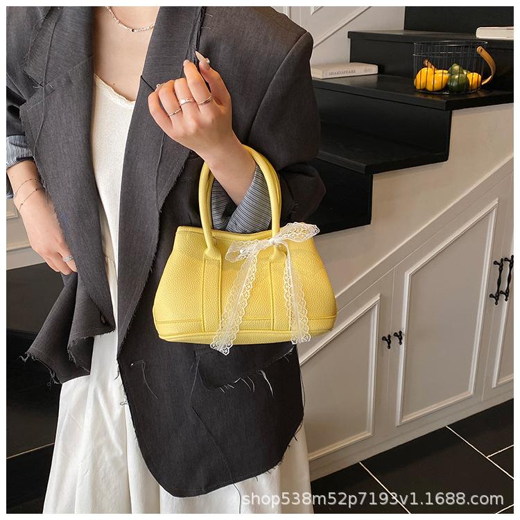 Summer popular lychee pattern small bag women's new fashion high sense messenger bag portable commute