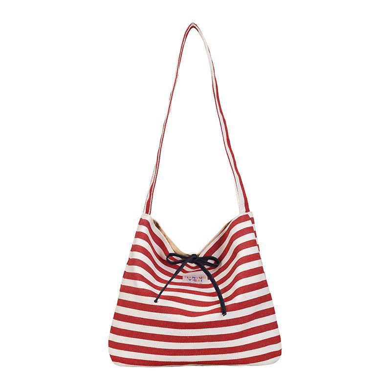 Casual striped canvas bag women's spring and summer new largecapacity commuter shoulder messenger bag