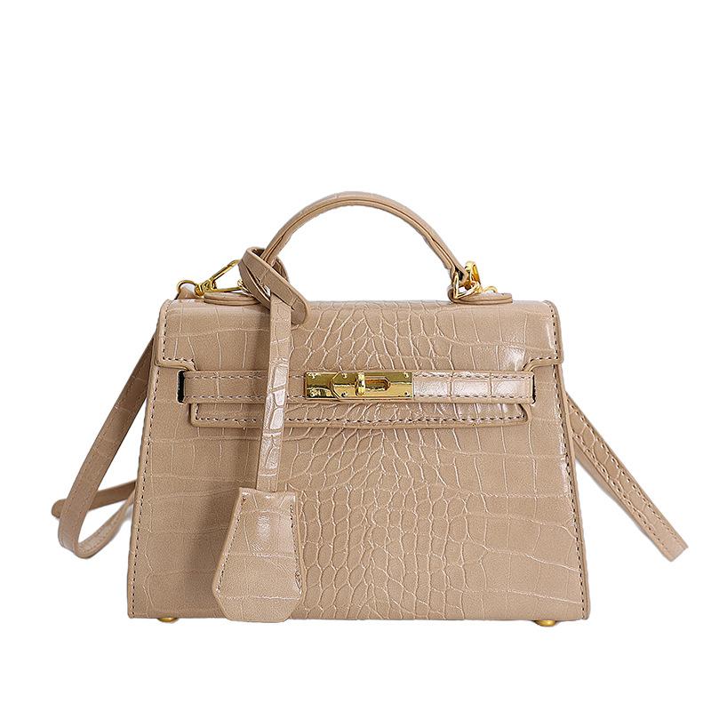 Korean version of fashionable niche stone pattern bag 2025 autumn new texture handbag retro fashion messenger bag bag