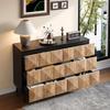 The sideboard and the dresser are characterized by a combination of black and natural wood tones as well as raised doors.